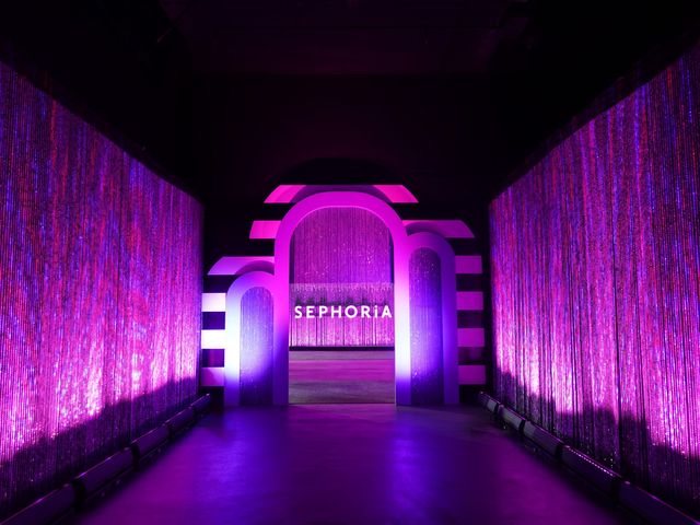 A neon-lit walk-through tunnel entrance at SEPHORiA inside Magic Box