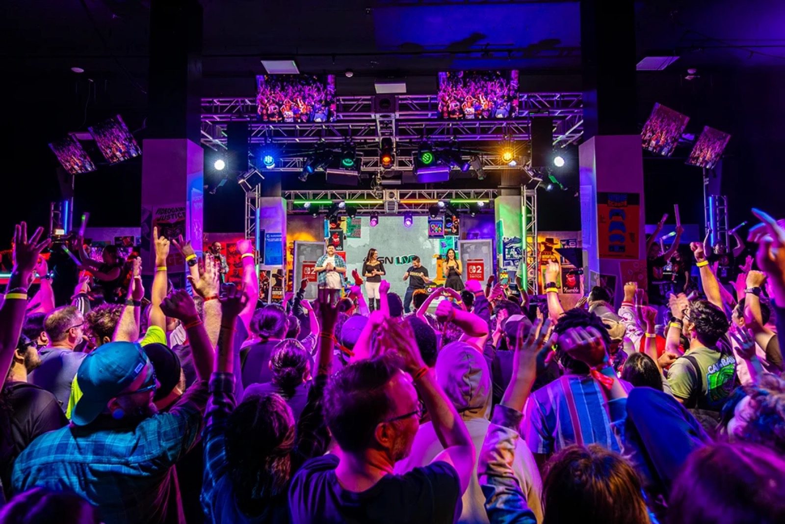 A cheering crowd in front of the IGN Live main stage at Magic Box