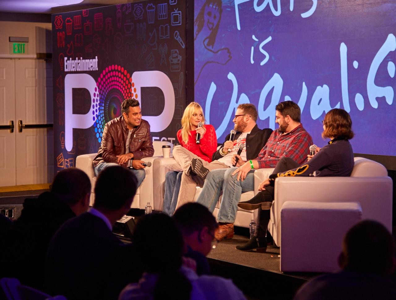 A speaker panel hosted in an intimate program space